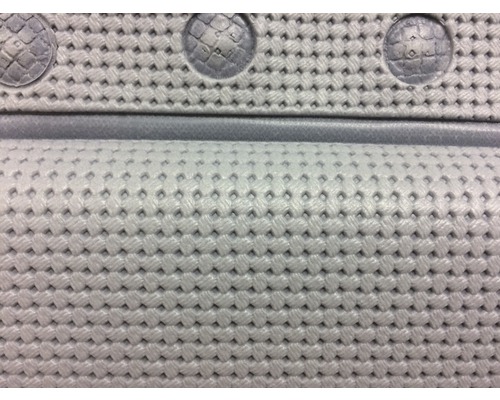 Närbild av ett strukturerat tyg