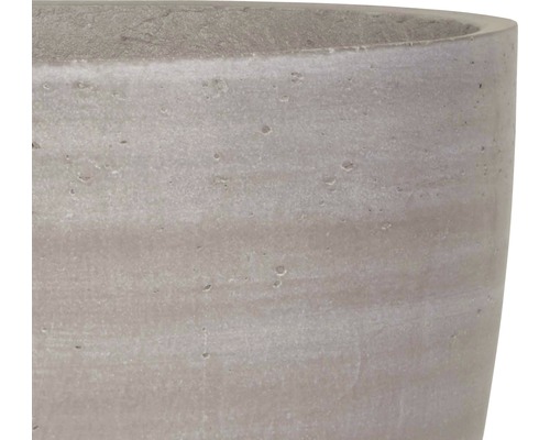 Detaljbild av en blomkruka i betong