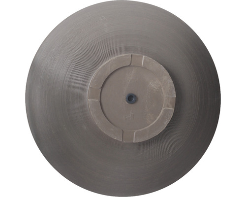 Undersida av en planteringskruka med vattenavloppshål