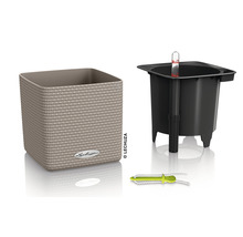 Blomkruka med bevattningssystem och vattennivåindikator