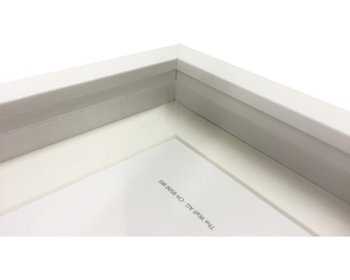 Detalj av en vit fotoram