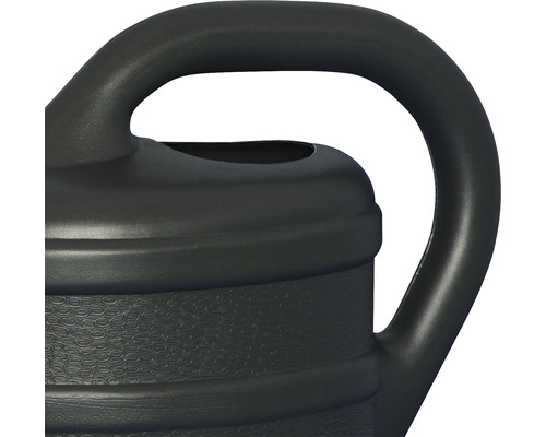 Detaljvy av en vattenkanna med handtag