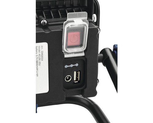 Detaljvy av en arbetslampa med strömbrytare, laddningsstatusindikator och USB-port