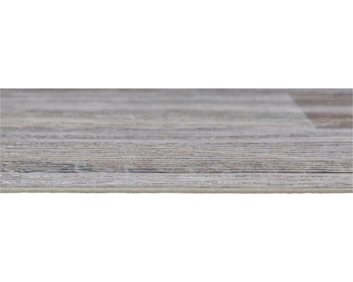 Närbild av ett vinylgolv med träutseende