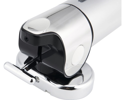 Detaljvy av en tvåldispenser för väggmontering.