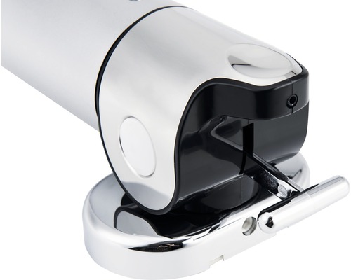 Närbild av en tvålpump i metall