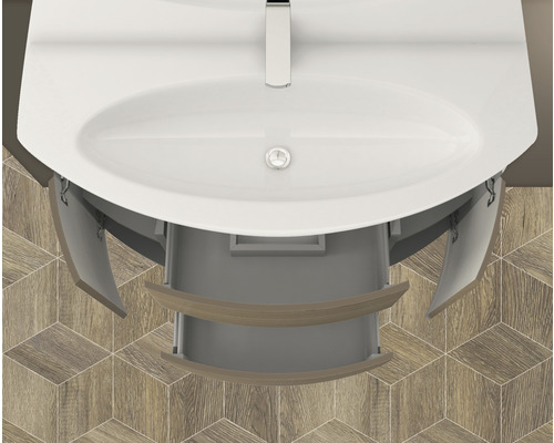 Ovanifrån av tvättställsskåp med öppen låda och dörrar