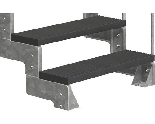 Detaljvy av en trappa med två steg, metallram och steg med ribbad struktur