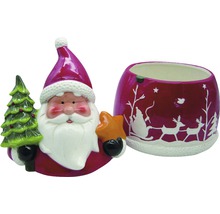 Dekorativ keramikset bestående av en jultomtefigur med träd och stjärna samt en matchande ytterkruka med vintermotiv