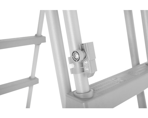 Detaljvy av ett barnsäkerhetslås på en barnsäng