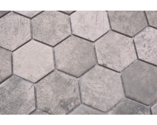 Sexkantiga plattor av stengods i ett mosaikmönster