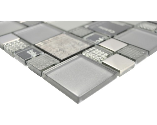 Mosaikplatta av glas och metall