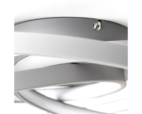 Närbild av en grå LED-taklampa med böjd design