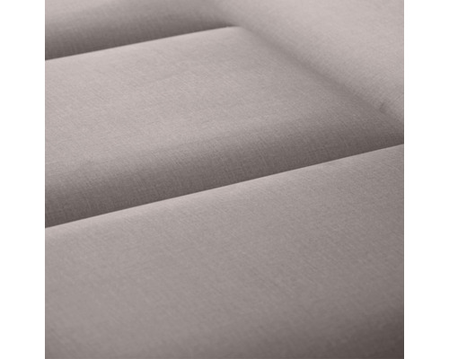 Närbild av en stoppad möbel