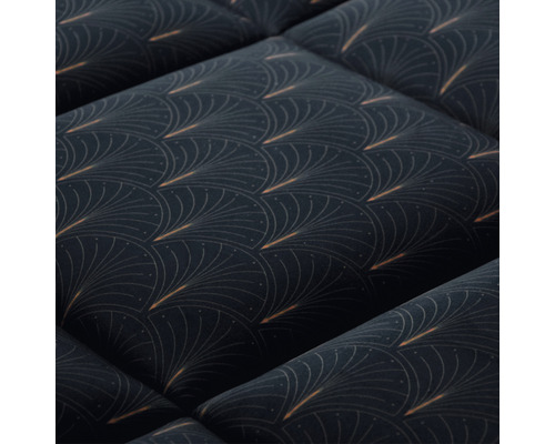 Quiltat tyg med grafiskt mönster