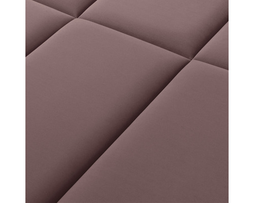 Detaljvy av en quiltad textilyta