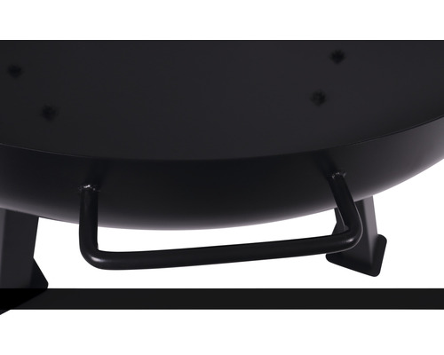 Detalj av en eldstad med handtag.