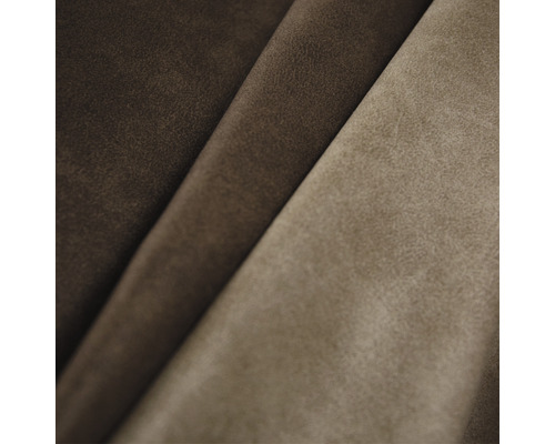 Närbild av möbeltyg i olika nyanser av brunt
