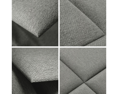 Detaljvy av en grå, quiltad möbelklädsel.