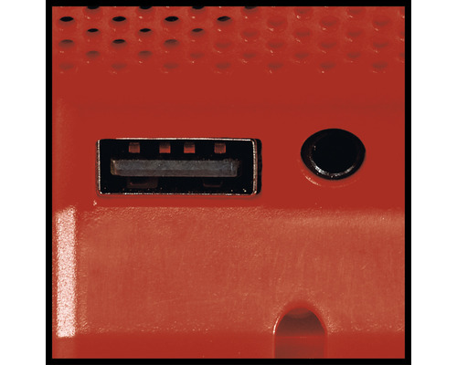 Närbild av en USB-port och ett hörlursuttag