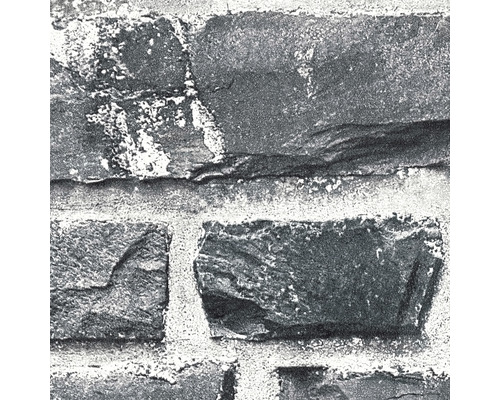 Närbild av en tapet med stenimitation.