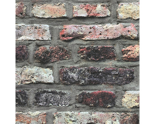 Närbild av en tapet med tegelmönster och grå fogar