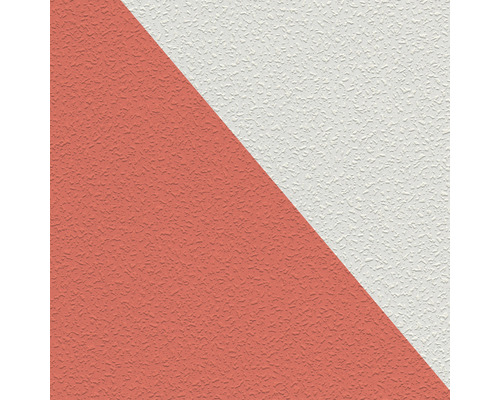 Närbild av en vägg med putsstruktur i två färger