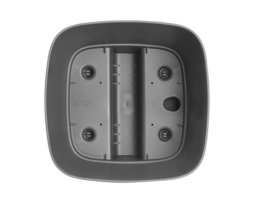 Grå blomkruka i plast underifrån