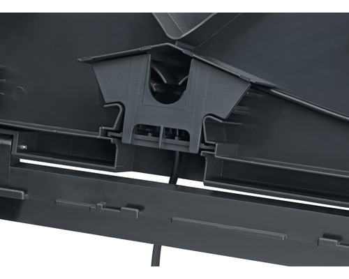 Detaljvy av ett dammfilterhus i plast