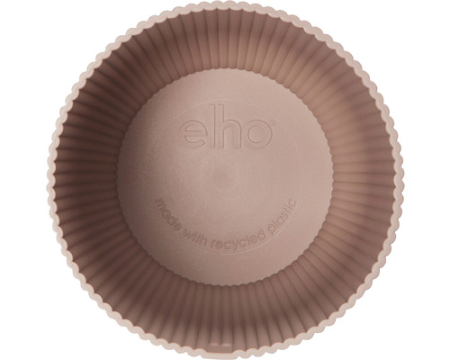 Innerbild av en blomkruka i återvunnen plast med Elho-logotyp