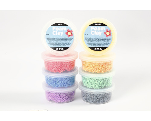 Flera burkar självhärdande modellmassa med pärlor