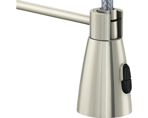 Närbild av en justerbar lampa med metallarm