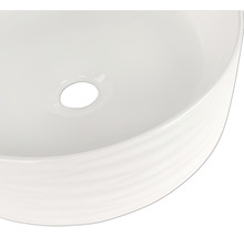 Tvättställ i keramik med avlopp