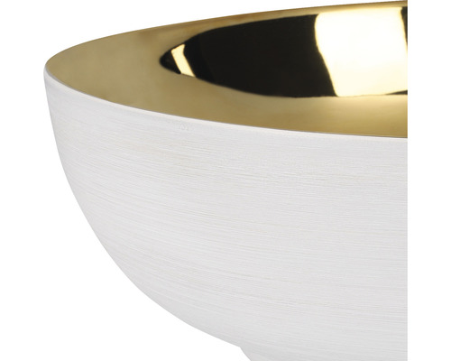 Dekorativ skål av konststen med metallinsida