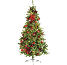 Dekorerad julgran med kulor och blommor på stativ