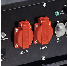 Närbild av två 230 voltsuttag på en generator