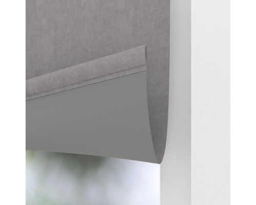 Grå rullgardin för fönsterdekoration och solskydd.