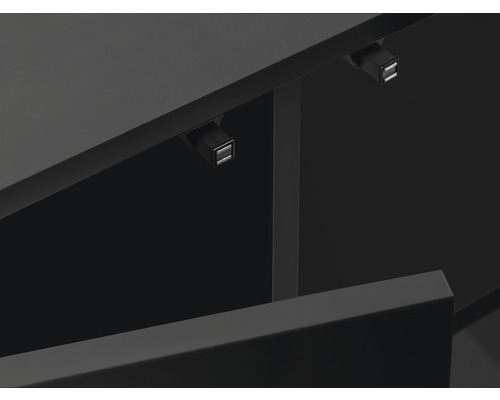 Detaljvy av en möbel med låda och liten lampa