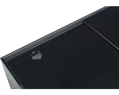 Detaljvy av ett akvarium med lock och ventilationsöppning