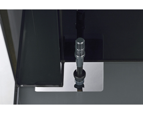 Detaljvy av ett akvarium med filterelement.