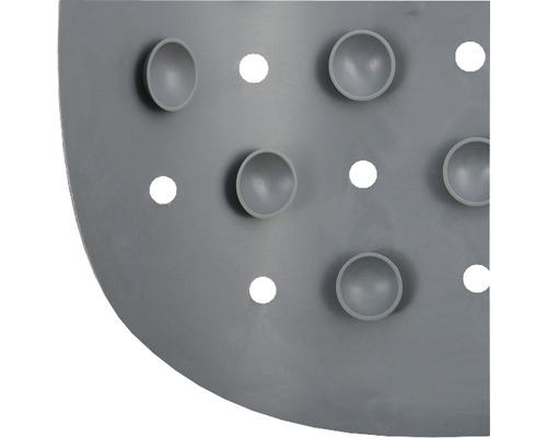 Detalj av en duschmatta med sugproppar