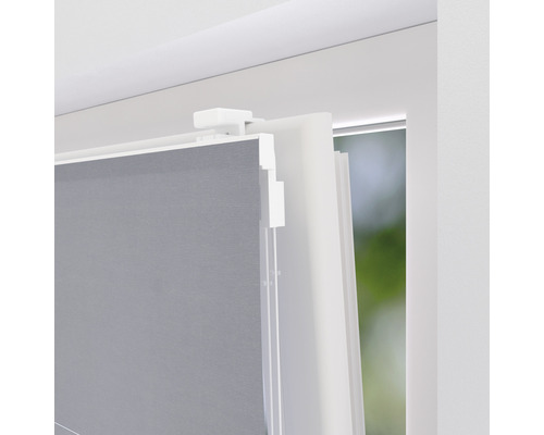 Detalj av en rullgardin på ett fönster med stöd