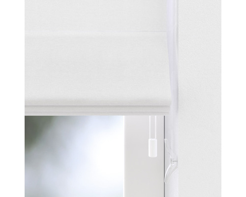 Vit plisségardin på fönstret