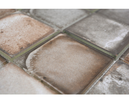 Detaljbild av kvadratiska mosaikplattor