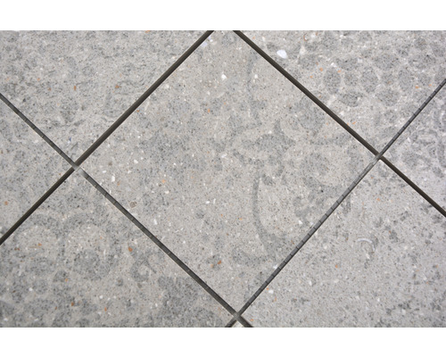 Kakel med spräcklig yta och fogar