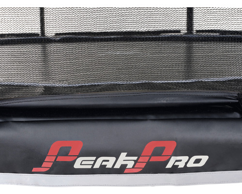 Detaljvy av en studsmatta med Peakpro logotyp.