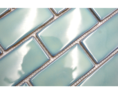 Rektangulära keramiska plattor i fiskbensmönster