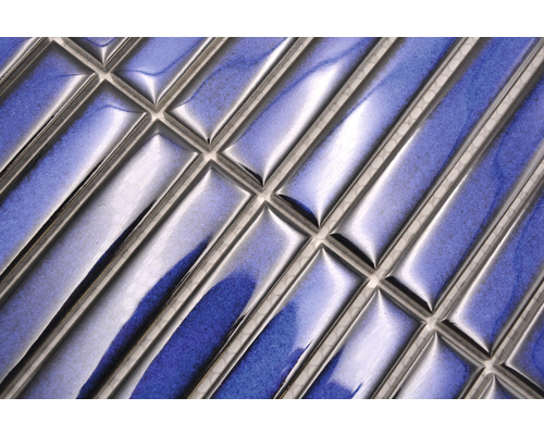 Närbild av mosaikplattor i stavform