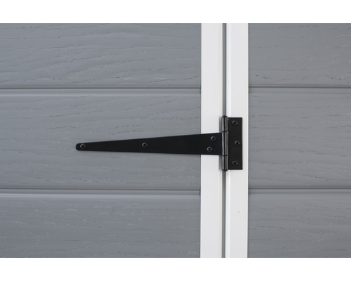 Svart T-format gångjärnsbeslag på en grå trädörr