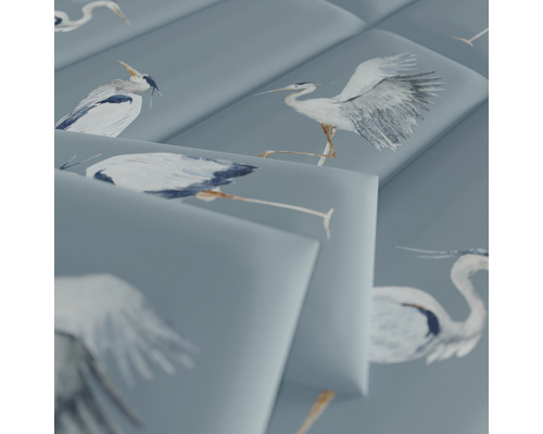 Närbild av kakel med hägermotiv